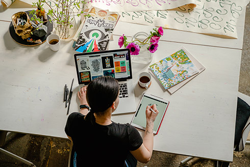 Designer working at desk